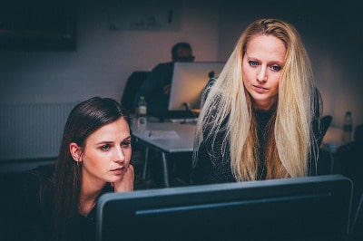 Women looking at a computer