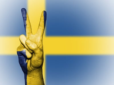 Sweden flag and victory sign