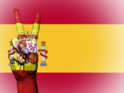 Spain flag and victory sign